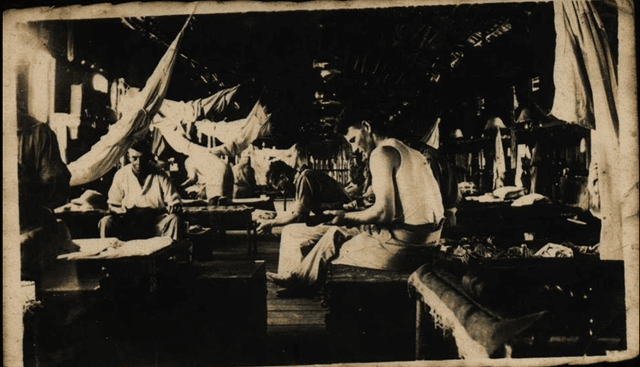 Bill Mullins in his camp during the war